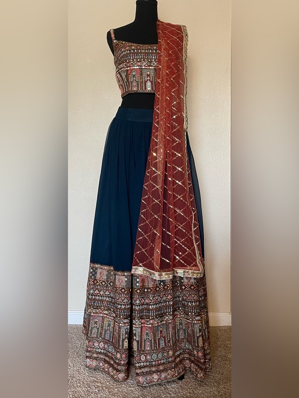 Blue and Orange Lehenga with detailed embroidery